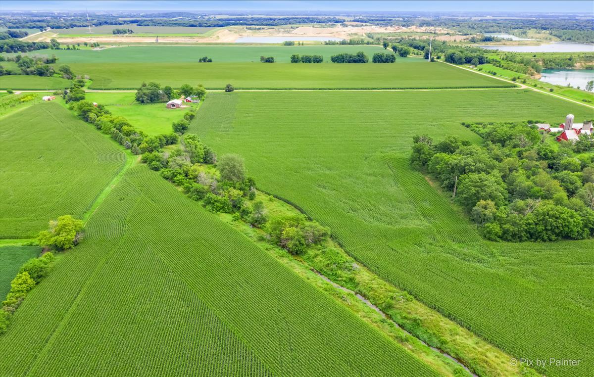 Lot 7 Rowe Road Elburn, IL 60119 - Photo 7 of 23 a view of a field with an ocean