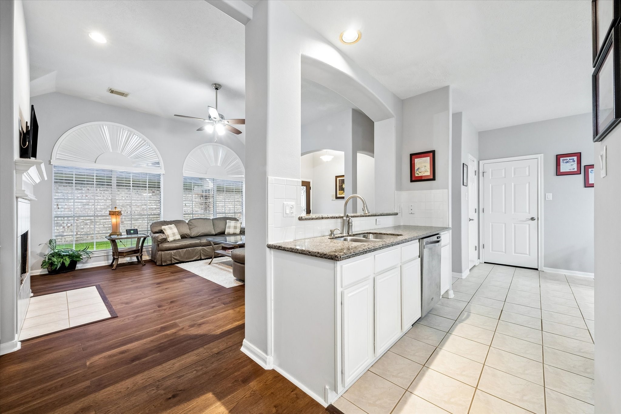 12423 Rutgers Park Court Houston, TX 77058 - Photo 16 of 29 a large white kitchen with a large window