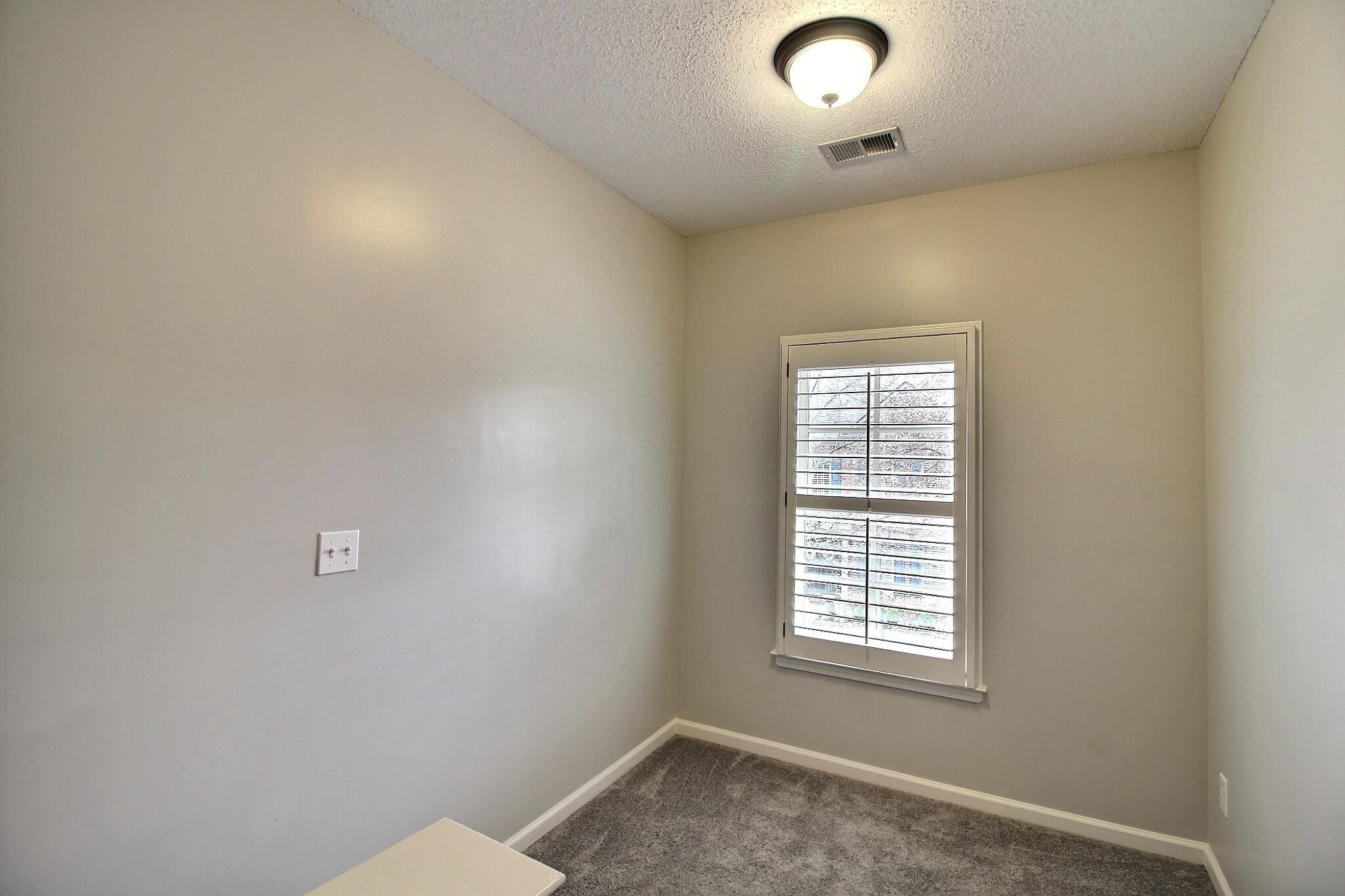 845 McFerrin Lane Collierville, TN 38017 - Photo 11 of 27 an empty room with a window