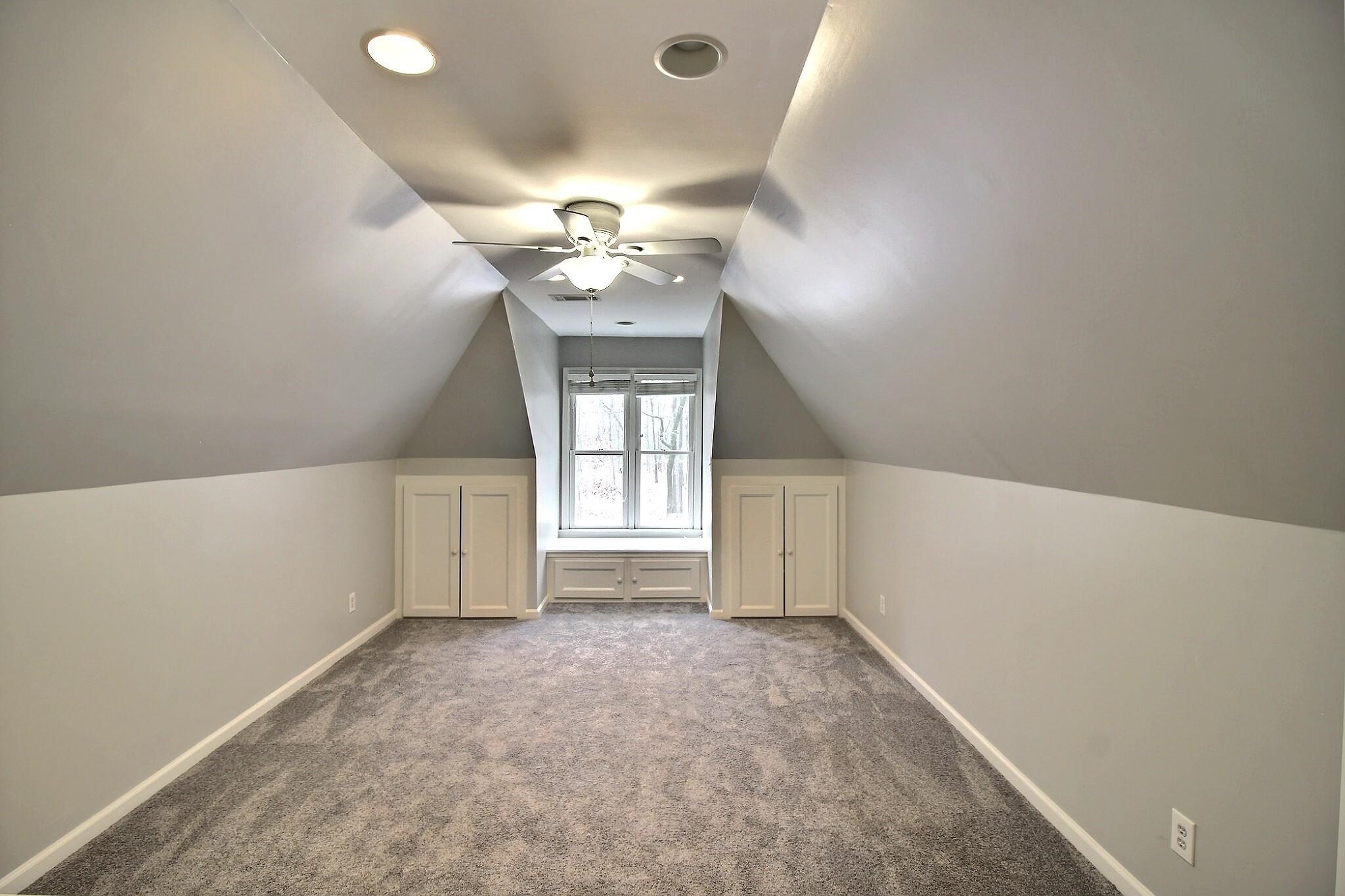 845 McFerrin Lane Collierville, TN 38017 - Photo 17 of 27 en empty room with windows and fan