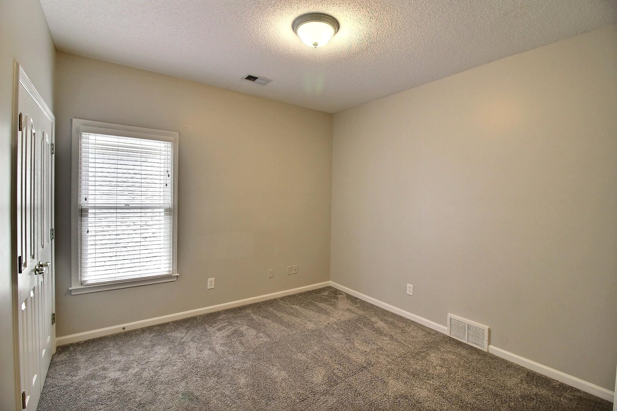 845 McFerrin Lane Collierville, TN 38017 - Photo 21 of 27 an empty room with a window