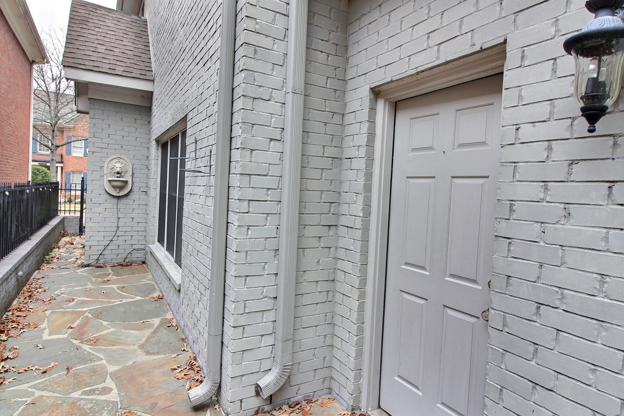 845 McFerrin Lane Collierville, TN 38017 - Photo 24 of 27 a view of a pathway along the building