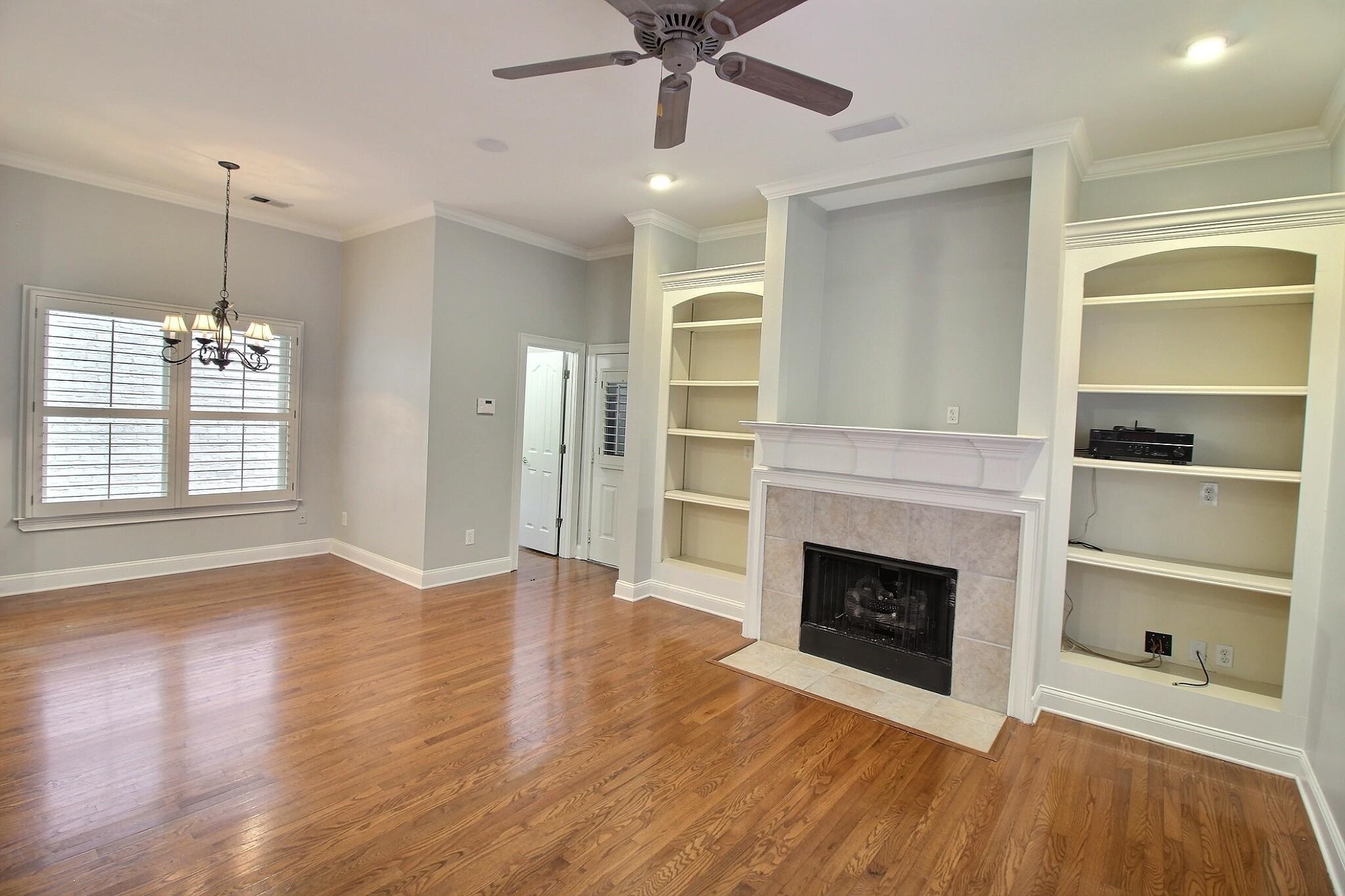845 McFerrin Lane Collierville, TN 38017 - Photo 4 of 27 a view of an empty room with a fireplace and a window