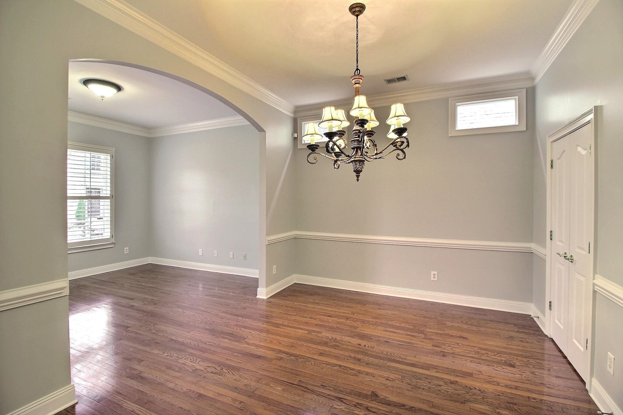845 McFerrin Lane Collierville, TN 38017 - Photo 10 of 27 a view of a room with wooden floor chandelier and entryway