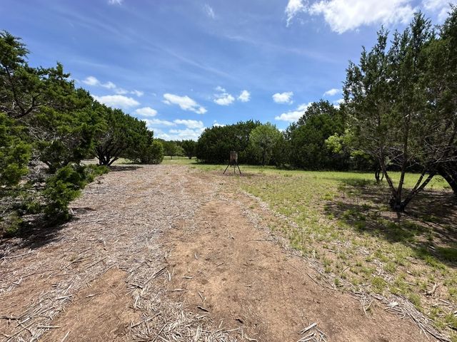 a view of a lake from a yard