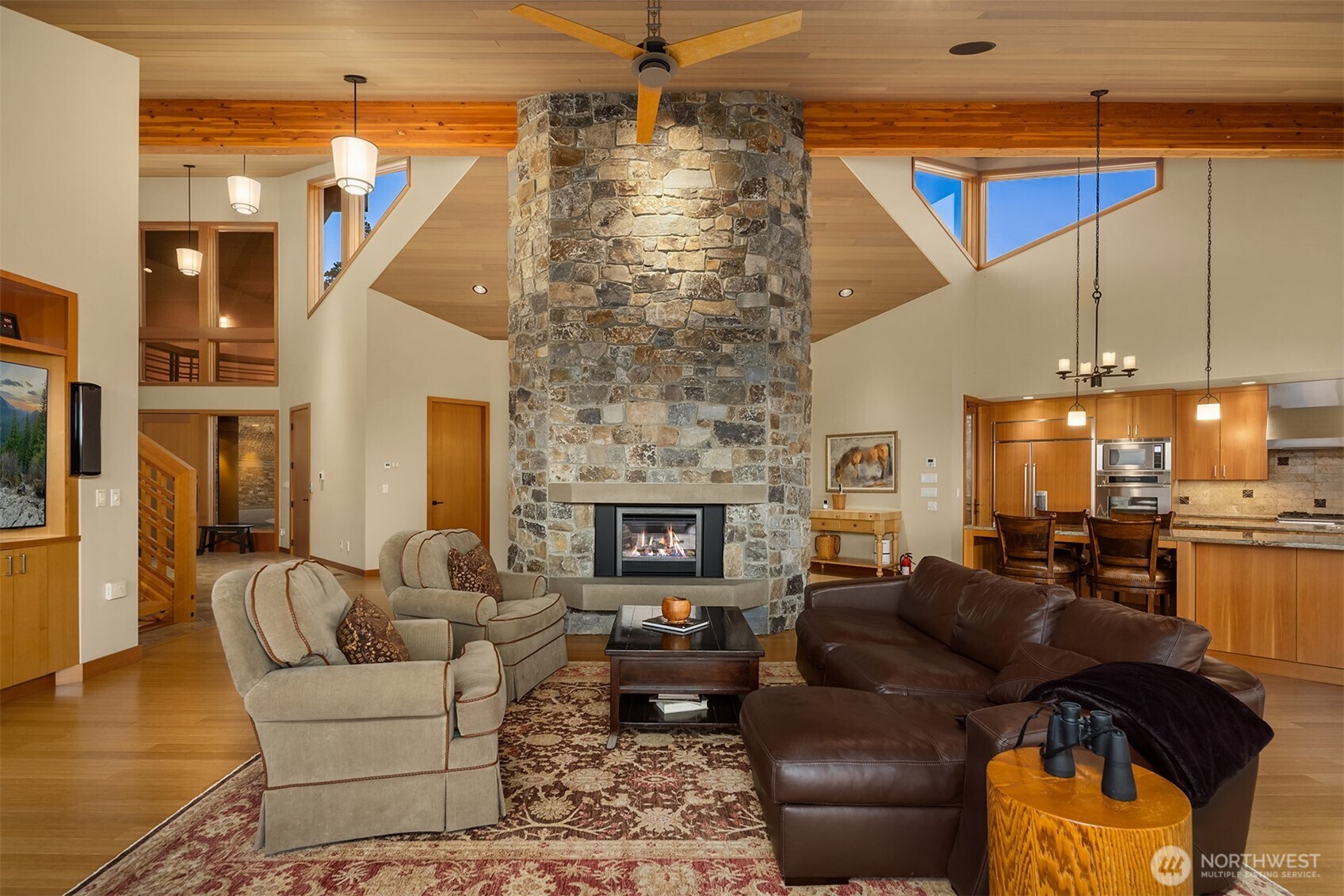 3653 Hart Road Cle Elum, WA 98922 - Photo 25 of 40 a living room with furniture and a fireplace