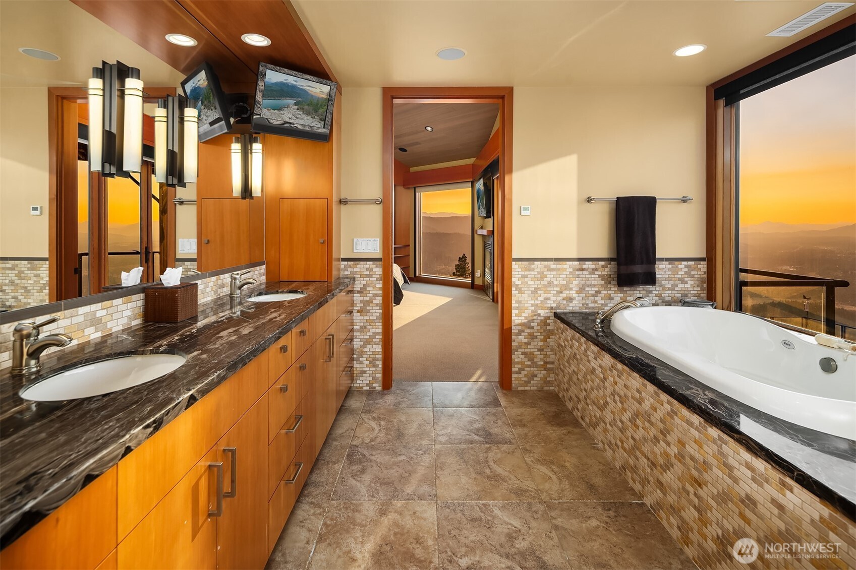 3653 Hart Road Cle Elum, WA 98922 - Photo 30 of 40 a bathroom with a granite countertop sink and a large mirror