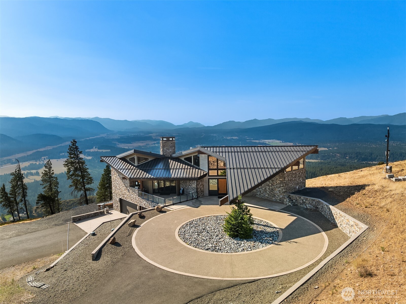 3653 Hart Road Cle Elum, WA 98922 - Photo 9 of 40 a view of a swimming pool with a patio