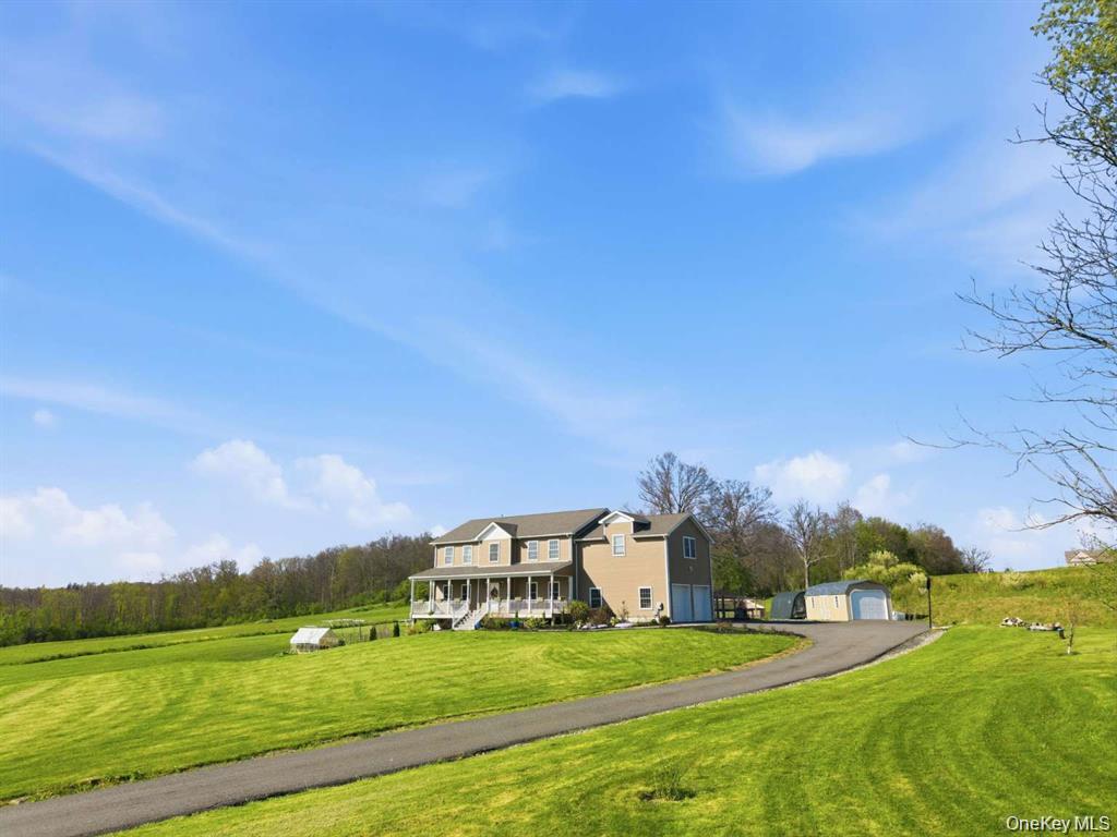 133 Old Chester Road Goshen, NY 10924 - Photo 29 of 33 a view of a big yard with a house
