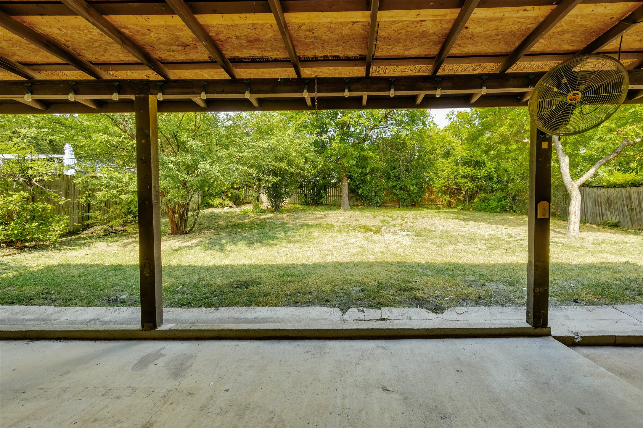 7506 Glenhill Road Austin, TX 78752 - Photo 18 of 20 A spacious, enclosed yard provides ample room for outdoor activities and relaxation.