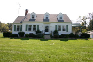 356 Cider Mill Road Mount Sidney, VA 24467 - Photo 1 of 1 a front view of a house with yard and green space