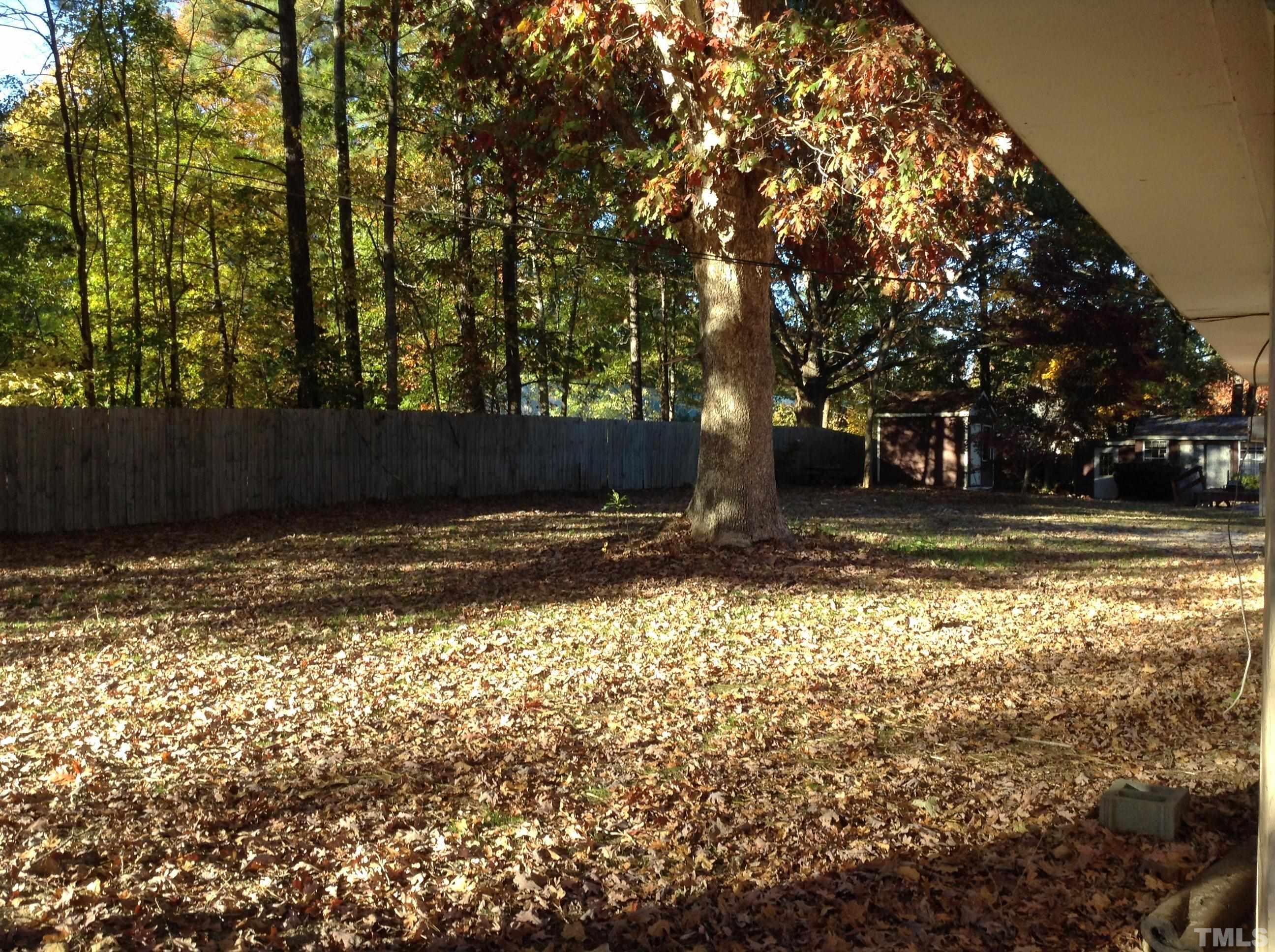 3901 Rock Quarry Road Raleigh, NC 27610 - Photo 4 of 10 a view of outdoor space with trees