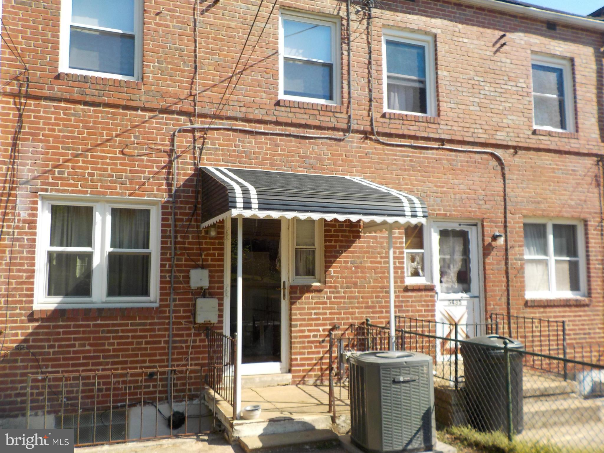5437 Channing Road Baltimore, MD 21229 - Photo 2 of 25 a front view of a house