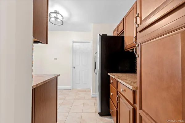 a kitchen that has a cabinets and a stove
