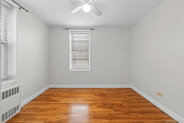 a view of a room with a large window