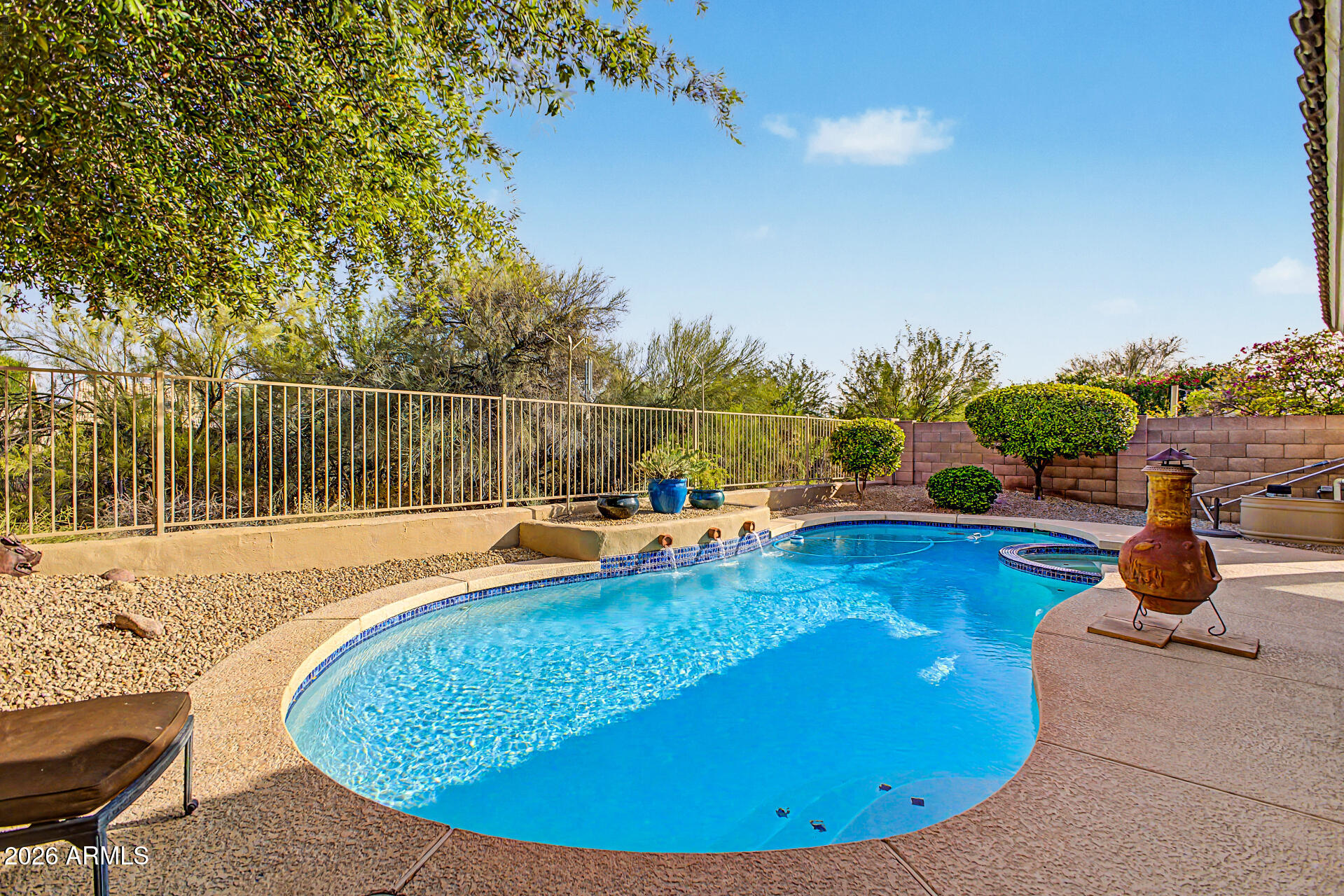 4309 East Rancho Caliente Drive Cave Creek, AZ 85331 - Photo 27 of 37 a view of a swimming pool with lounge chair