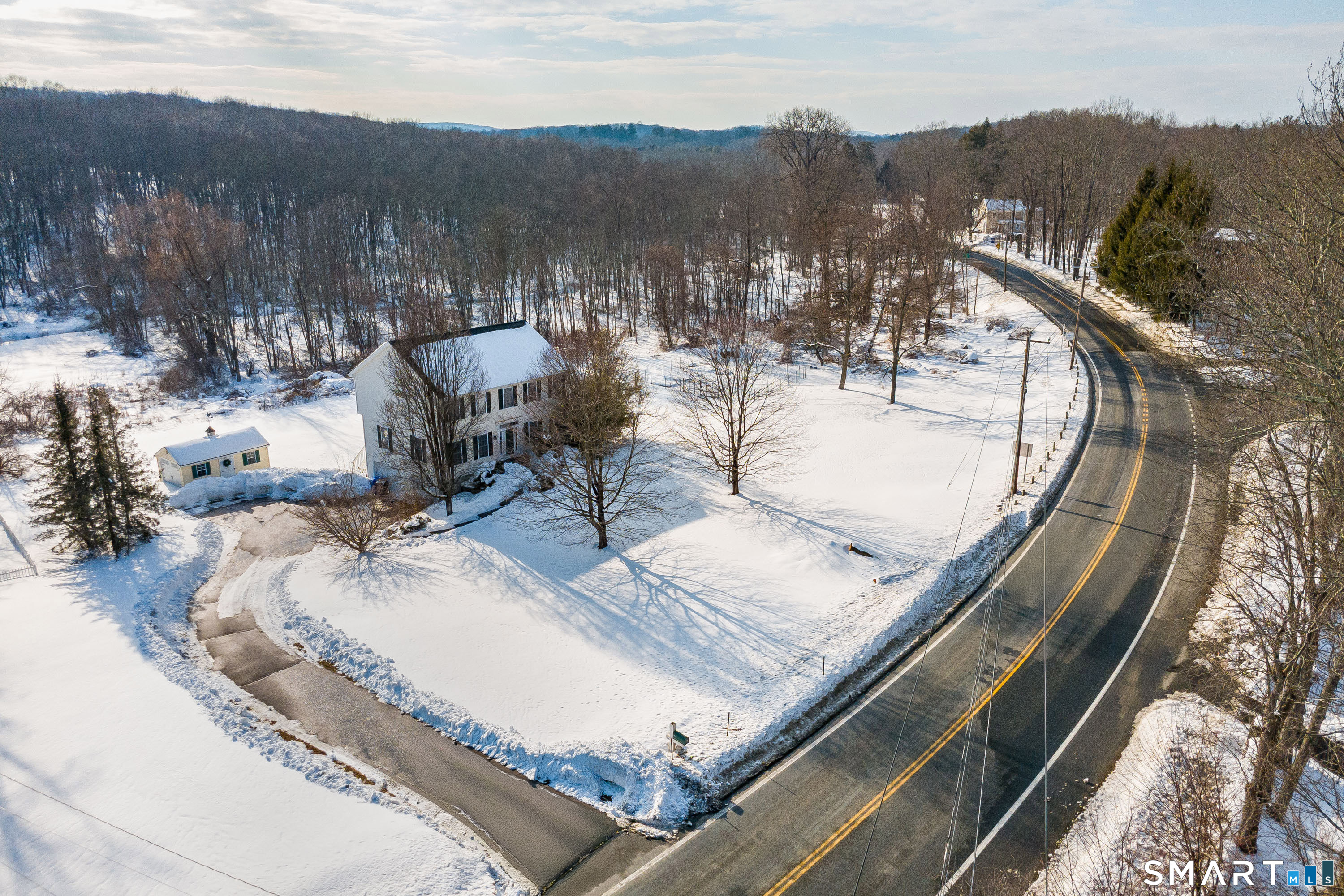 73 Dodgingtown Road Newtown, CT 06470 - Photo 16 of 39 a view of a swimming pool with a mountain