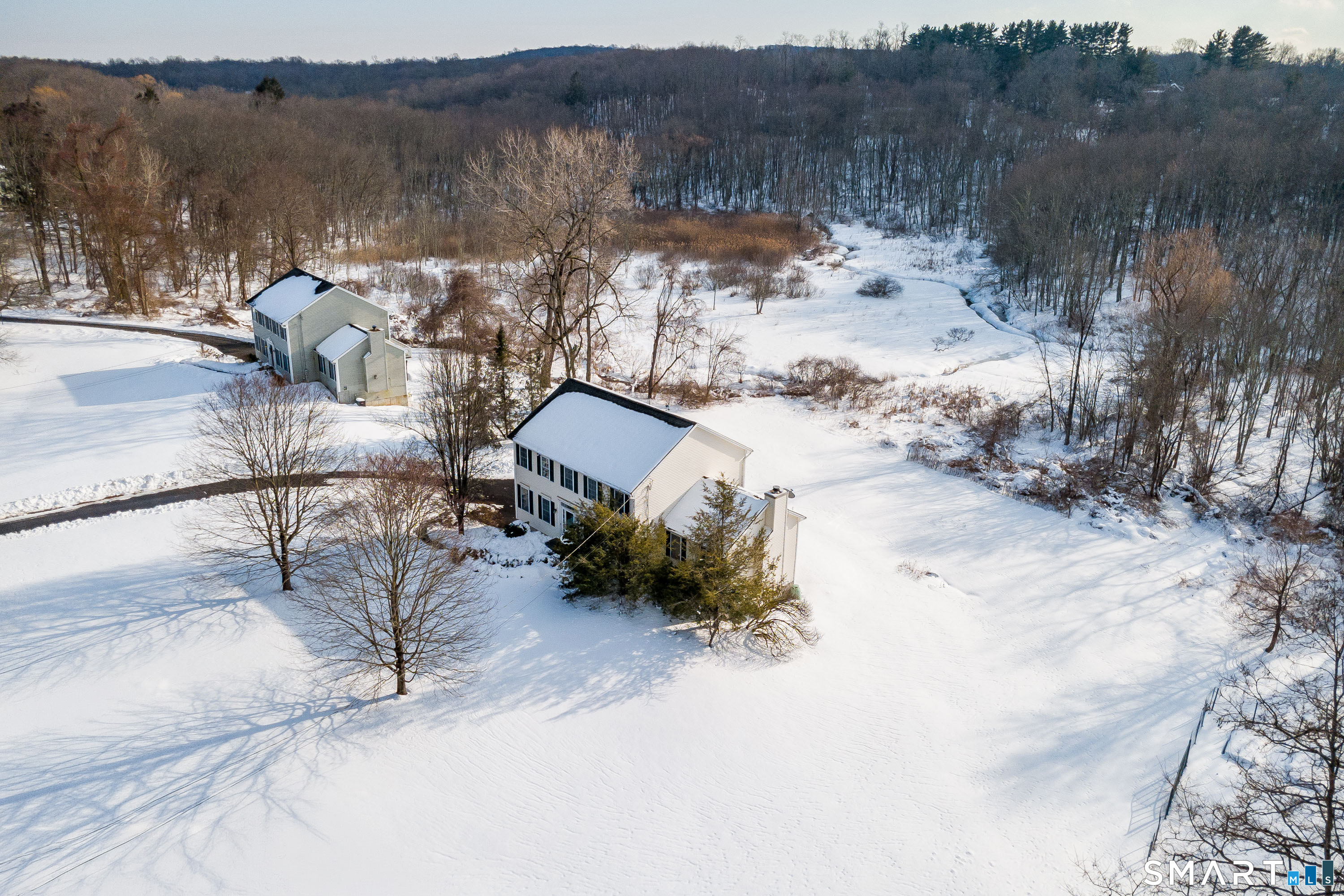 73 Dodgingtown Road Newtown, CT 06470 - Photo 17 of 39 a view of a backyard of a house