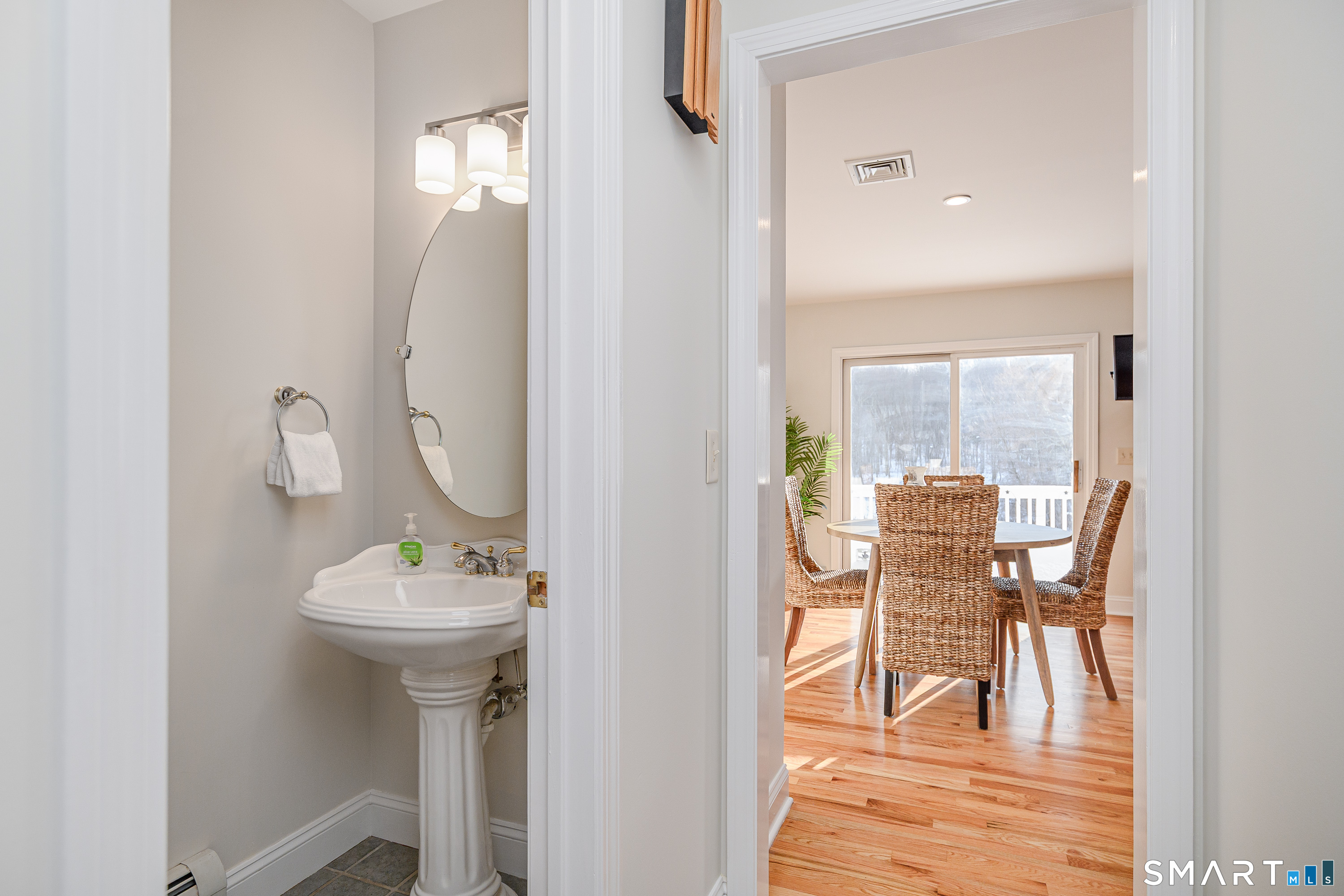 73 Dodgingtown Road Newtown, CT 06470 - Photo 24 of 39 a view of a living room and dining room