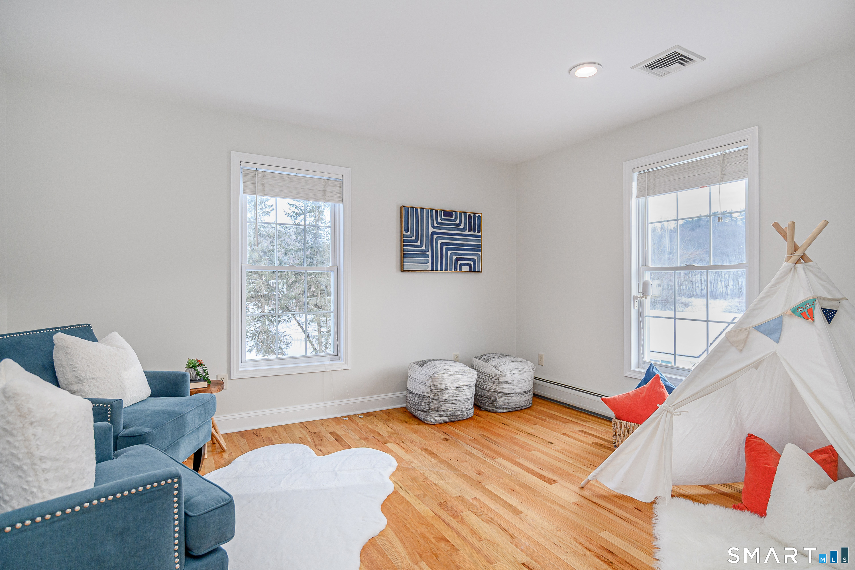 73 Dodgingtown Road Newtown, CT 06470 - Photo 27 of 39 a bedroom with furniture and a window