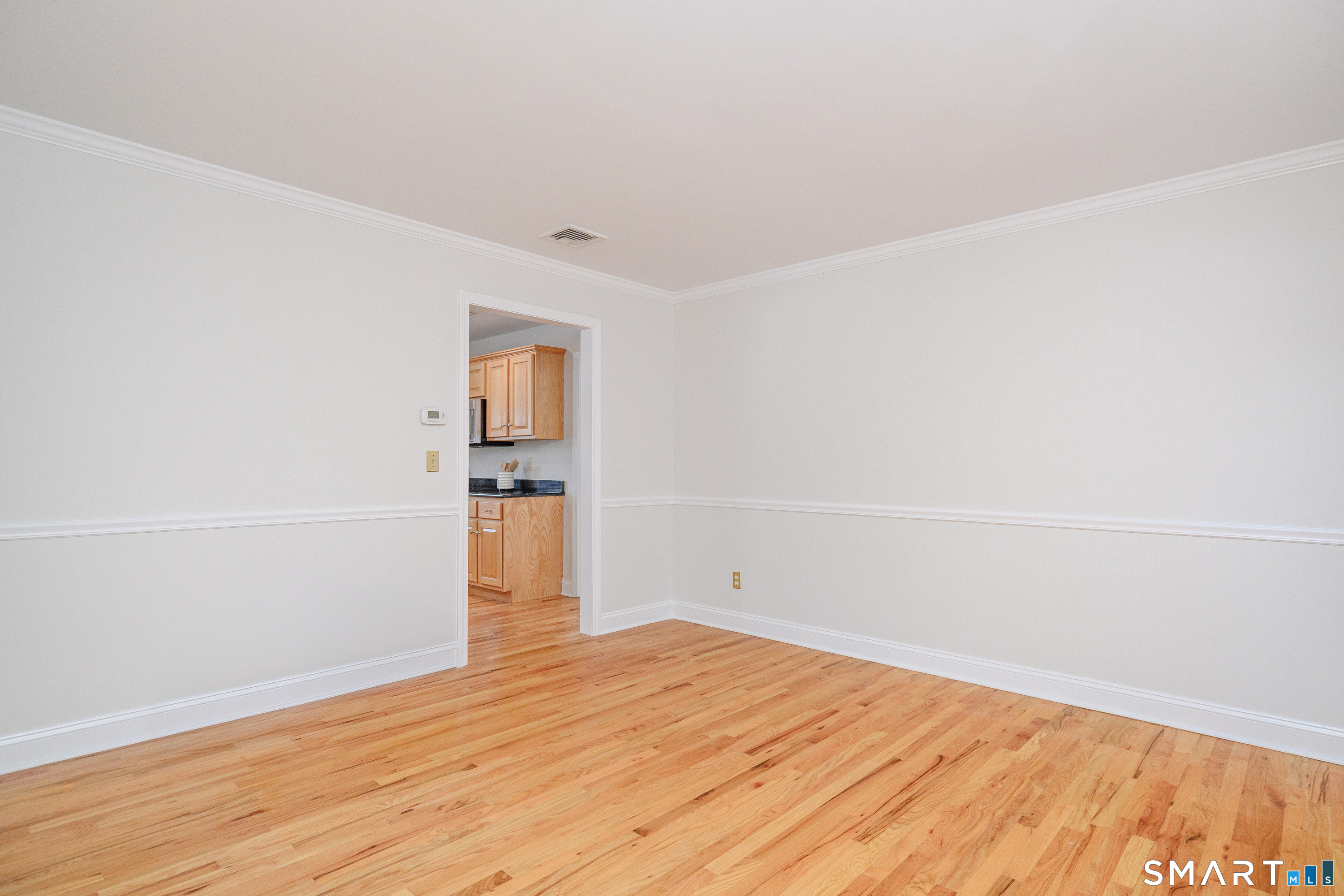 73 Dodgingtown Road Newtown, CT 06470 - Photo 31 of 39 a view of empty room with wooden floor