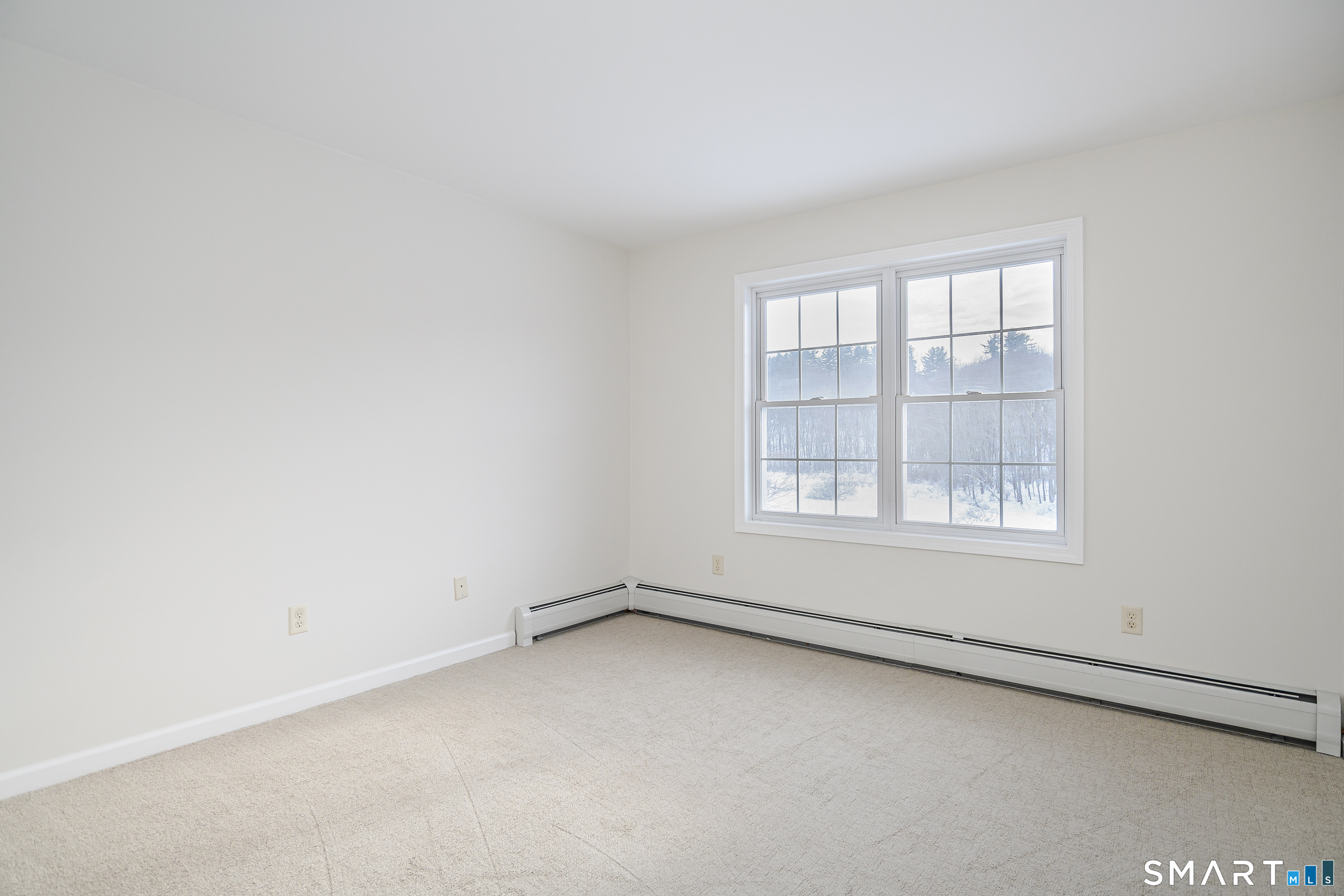 73 Dodgingtown Road Newtown, CT 06470 - Photo 8 of 39 an empty room with a window