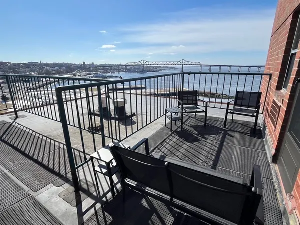 a view of balcony with seating space