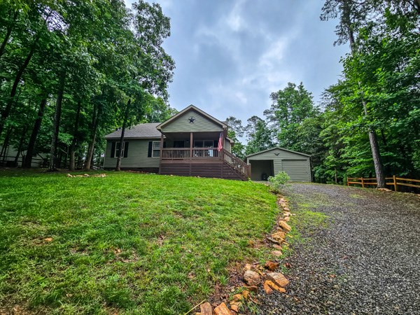 1385 Villa Drive Ellijay, GA 30540 - Photo 2 of 17 a front view of a house with garden