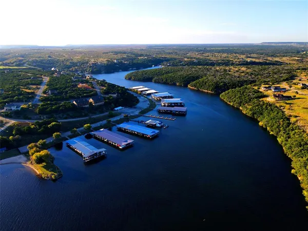 a view of a lake with a nearby beach