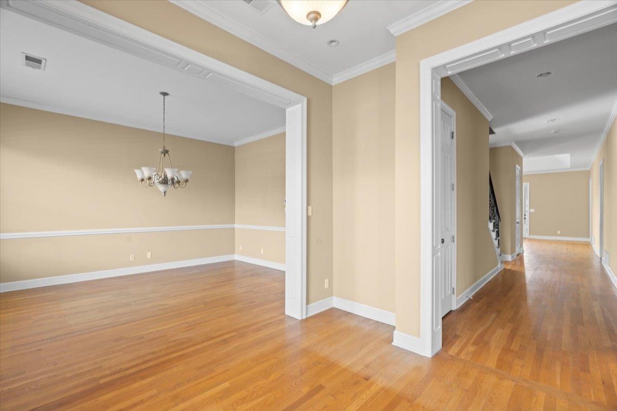 1435 Kimbrough Road Germantown, TN 38138 - Photo 23 of 34 a view of a hallway with wooden floor
