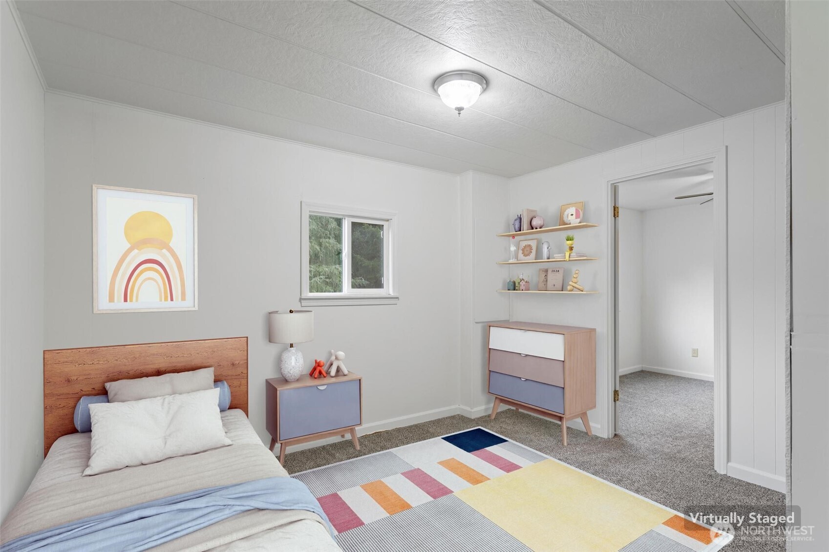 115 Cinebar Road Cinebar, WA 98533 - Photo 12 of 25 a bedroom with a bed and cabinets