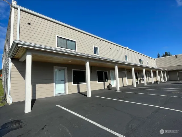 a front view of a house with a garage