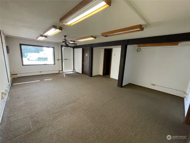 an empty room with windows