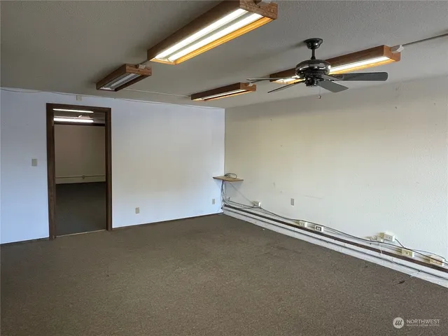 a view of a room with racks on the wall