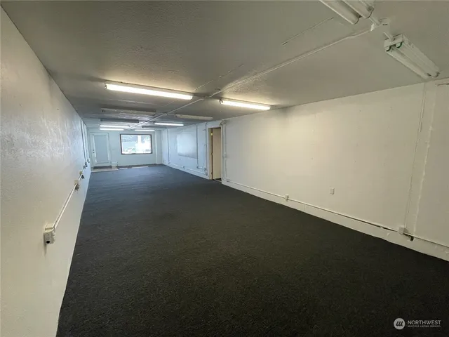 a view of a livingroom with a hallway