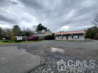4271 Highway 27, Unit 73 Princeton, NJ 08540 - Photo 2 of 23 a front view of a house with a yard