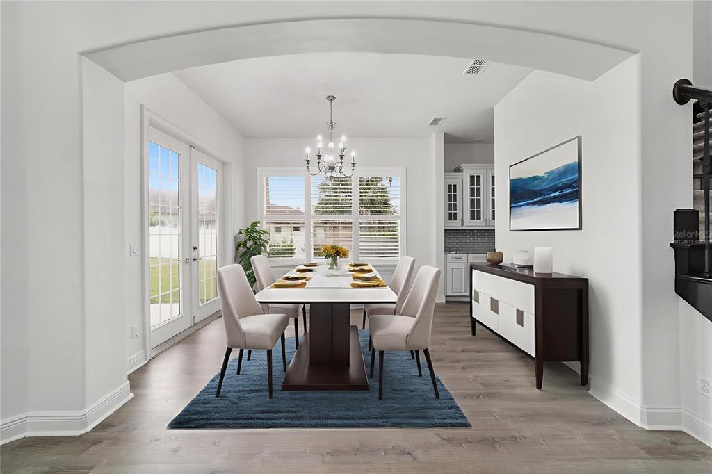 1718 Southwest 27th Street Ocala, FL 34471 - Photo 11 of 91 a view of a dining room with furniture window and wooden floor