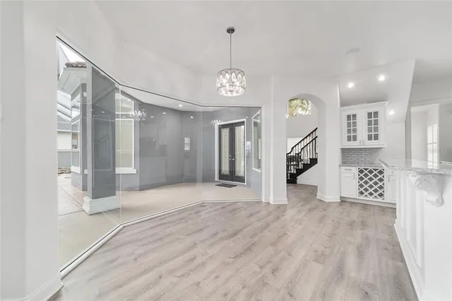 a bathroom with a sink toilet and mirror