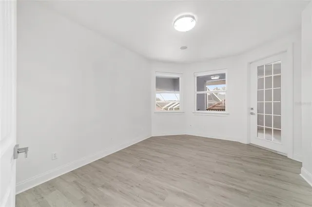 an aerial view of a house with outdoor space pool seating area and yard