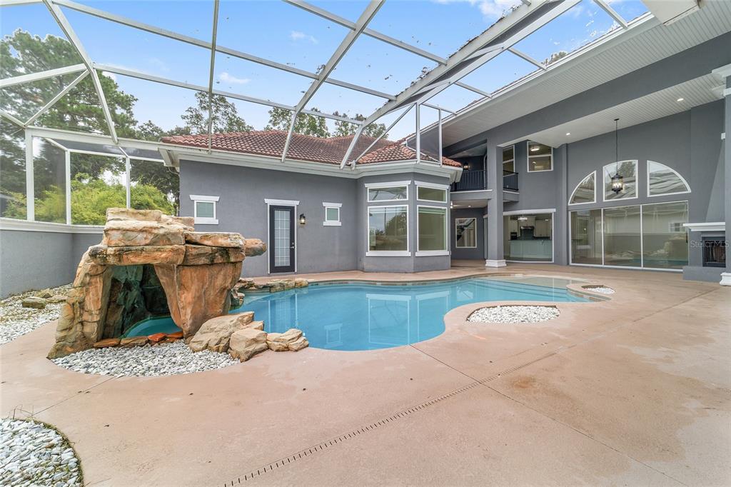 1718 Southwest 27th Street Ocala, FL 34471 - Photo 66 of 91 a view of a house with couches chairs and wooden floor