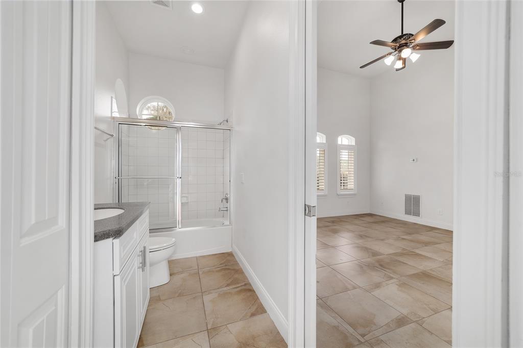 1718 Southwest 27th Street Ocala, FL 34471 - Photo 72 of 91 a view of a hallway with closet and a chandelier fan