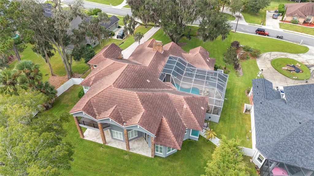 1718 Southwest 27th Street Ocala, FL 34471 - Photo 88 of 91 an aerial view of a house with outdoor space pool seating area and yard