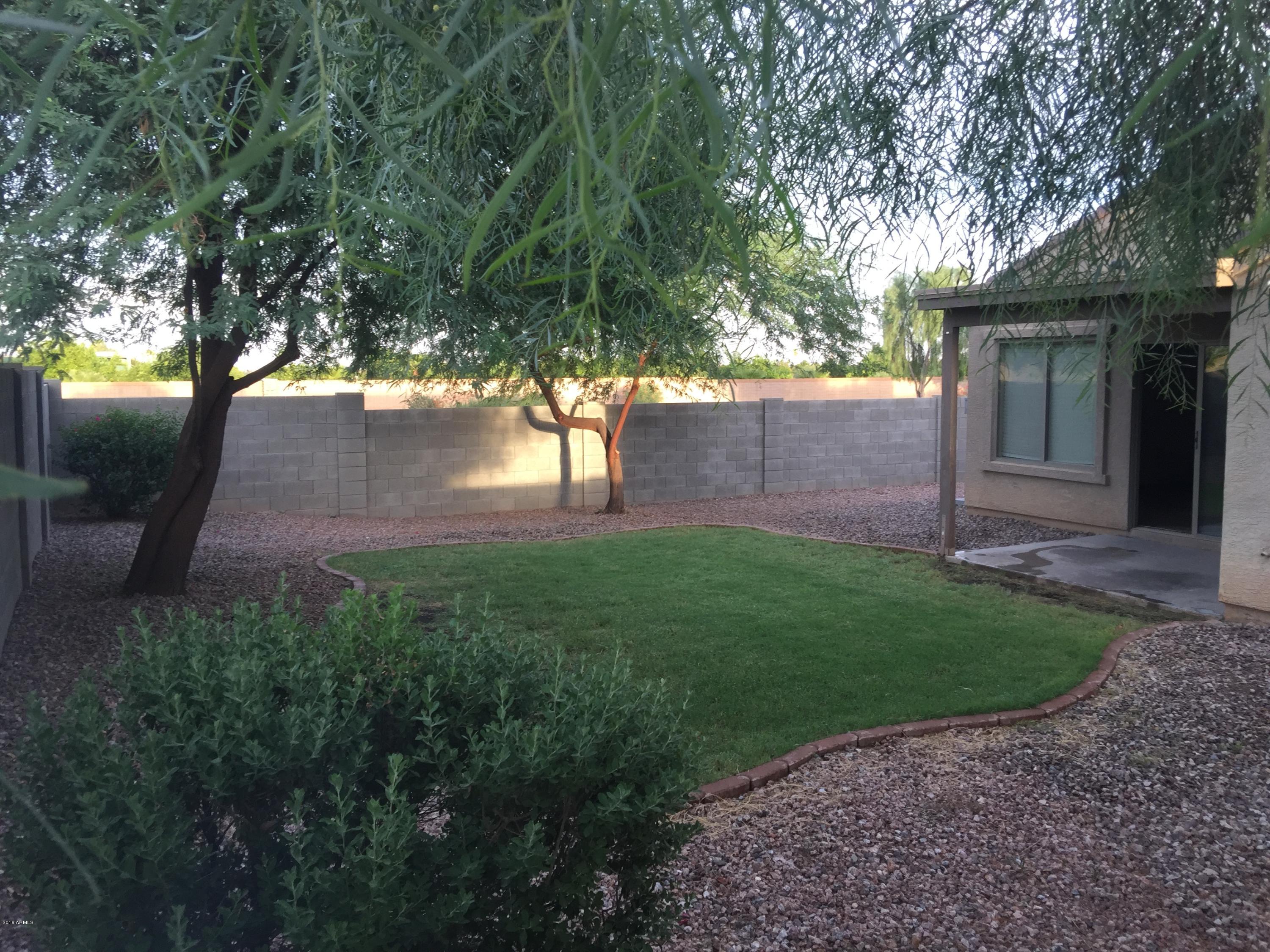 17420 West Calavar Road Surprise, AZ 85388 - Photo 4 of 12 Park like Backyard