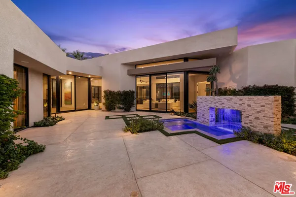 a view of swimming pool with patio
