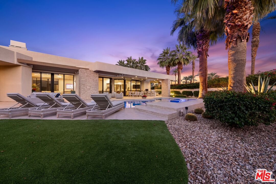 79400 Stonegate La Quinta, CA 92253 - Photo 42 of 46 a view of a house with backyard porch and sitting area