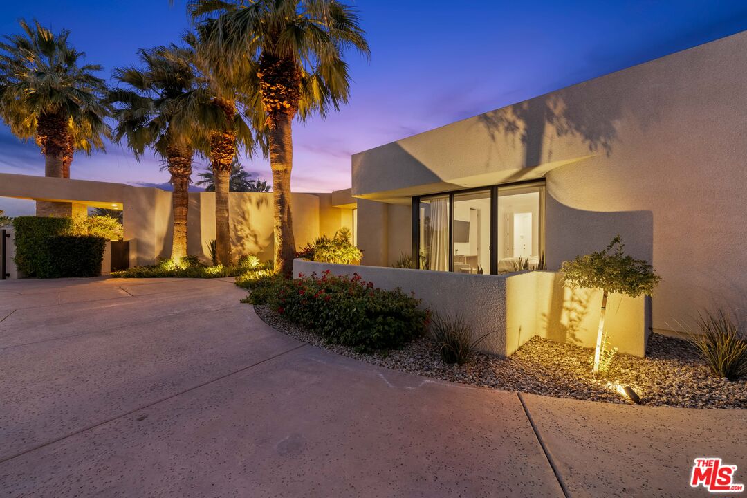 79400 Stonegate La Quinta, CA 92253 - Photo 46 of 46 a front view of a house with a yard