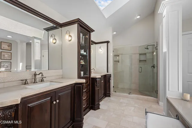 a view of a patio with table and chairs and potted plants