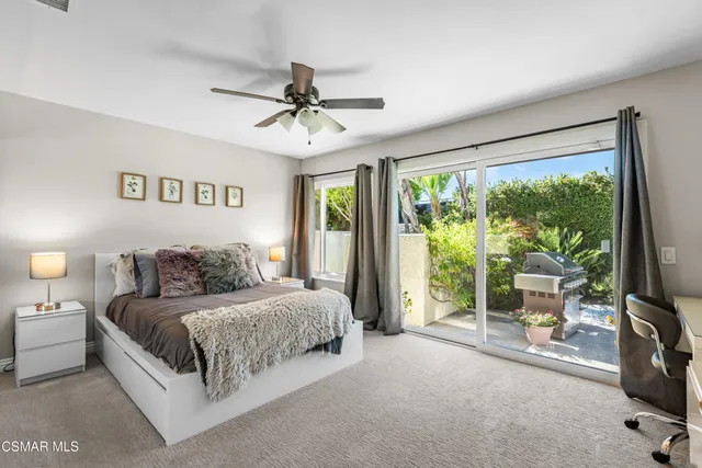 a bed room with a bed and a couch