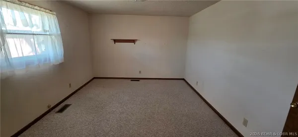 $204,900 | 116 Laurie Heights Drive, Laurie, MO 65037