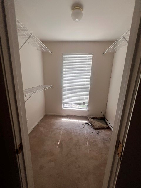 6304 South Rice Avenue Bellaire, TX 77401 - Photo 14 of 16 an empty room with windows